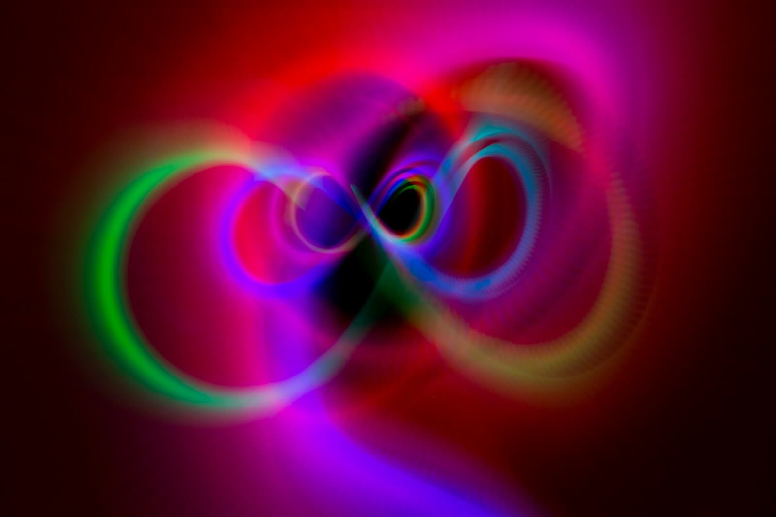 Photo by Ivan Slade a computer generated image of a colorful swirl